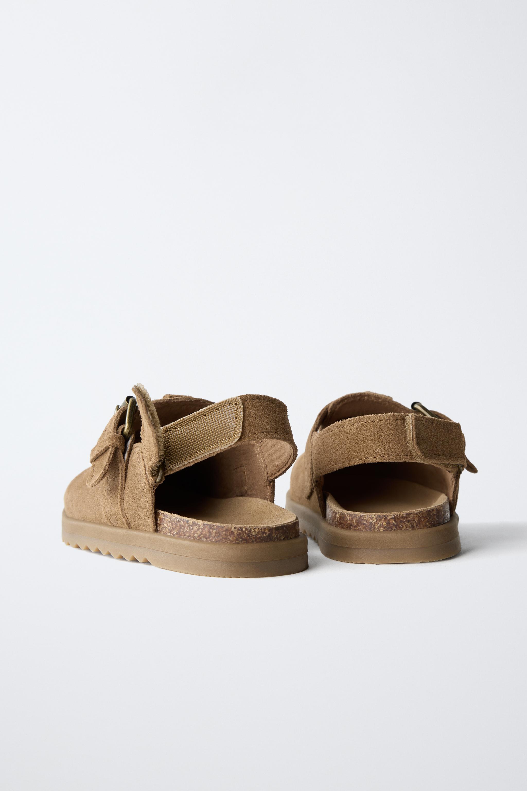 SABOTS EN CUIR
